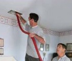 Men Cleaning out Air Duct Cleaning - Air Duct Cleaning